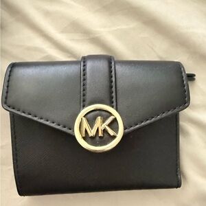 Michael Kors Black and Gold Wallet with Sleek Design